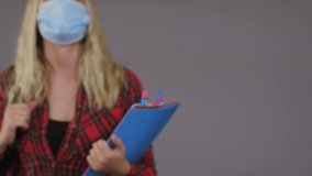 Close Up of Student Wearing Face Mask - Powered by Shutterstock - Get 15% off with code: PIKWIZARD15