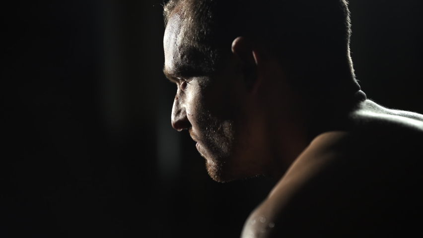 Man angrily breathing after a fight,sweating,veins,muscles clenched. Royalty-Free Stock Footage #1073139836
