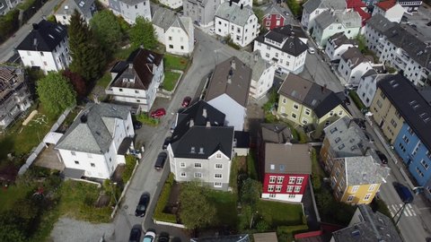 Top down view over Bergen Laksevaag and Damsgaard neighborhood - tilting up to reveal city with fjord and the whole neighborhood- Norway