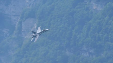Mollis Air Show Switzerland AUGUST, 16, 2019. Closeup of a military fighter jet plane in slow motion. McDonnell Douglas F-18 Hornet, Boeing, of Swiss Air Force