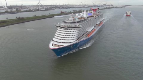Port of Rotterdam, the Netherlands - 12 22 2020: Aerial view of Carnival Cruise Line cruise ship the Mardi Grass. Cruise ship Mardi Grass is arriving at the port of Rotterdam for the first time.