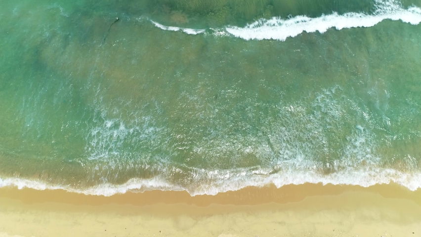 Quy Nhon beautiful beach and some peple walking in the morning in the Quy Nhon City, Viet Nam.