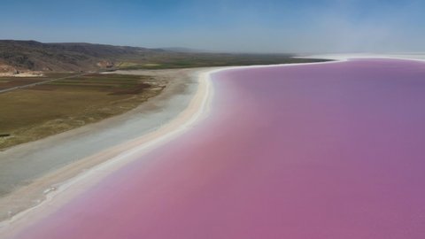 salt lake that turns pink due to algae and bacteria