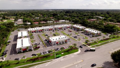 COOPER CITY, FL, USA - MAY 27, 2021: Aerial video modern shopping plaza Cooper City florida