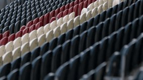 Empty rows of football rugby seats in stadium. Slow focus pull - Powered by Shutterstock - Get 15% off with code: PIKWIZARD15