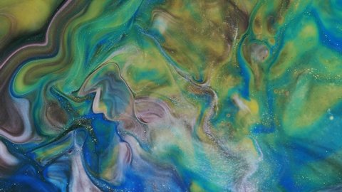 Pastel colors of paint stains. Abstract light pastel streams flow along the plane on a blue background. Marble texture. Fluid art. Liquid abstractions.