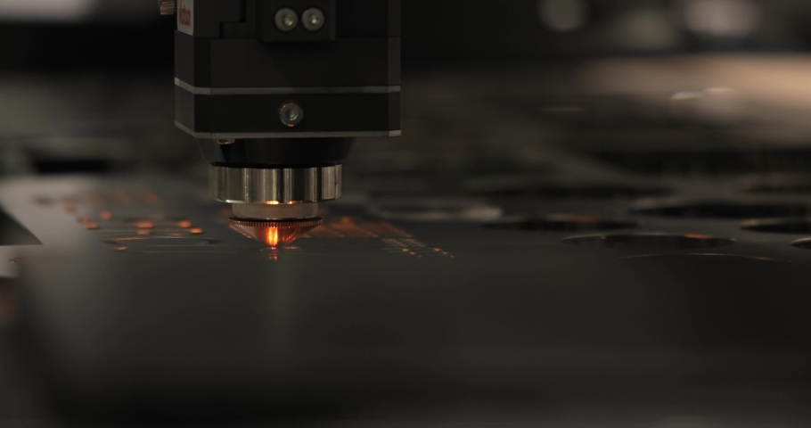 CNC Laser cutting of metal, modern industrial technology Making Industrial Details. The laser optics and CNC (computer numerical control) are used to direct the material or the laser beam generated. Royalty-Free Stock Footage #1073199584
