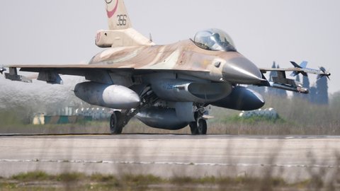 Andravida Greece APRIL, 03, 2019 Close up of fighter jet take of with full afterburner power. Lockheed Martin F-16 C Barak or Fighting Falcon or Viper of Israeli Air Force IAF