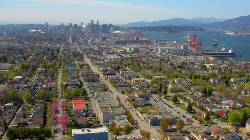 Wide aerial drone view flying over beautiful Vancouver, British Columbia, Canada.