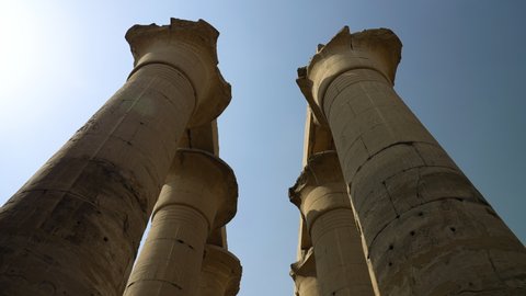 Ancient Columns In Luxor Temple, Luxor, Egypt - tilt down shot