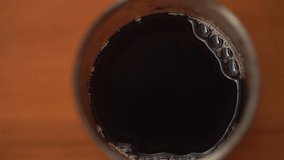 4K slow motion footage for dripping coffe in the glass close up video