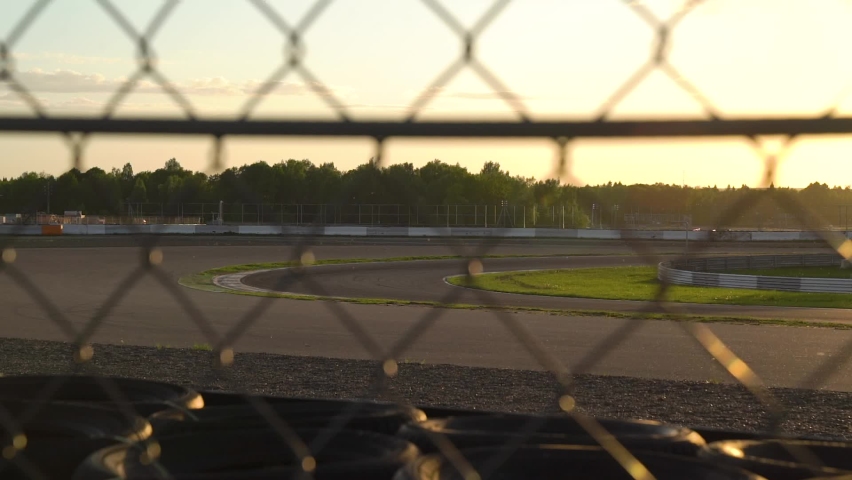 Sports circuit at sunset, tires lie