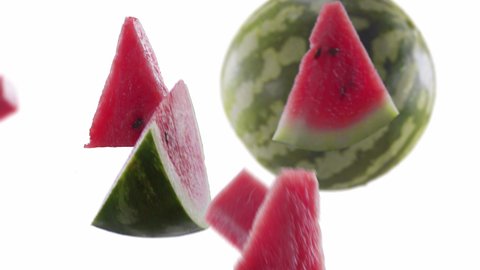 Flying of Watermelon and Slices in White Alpha Matte Background