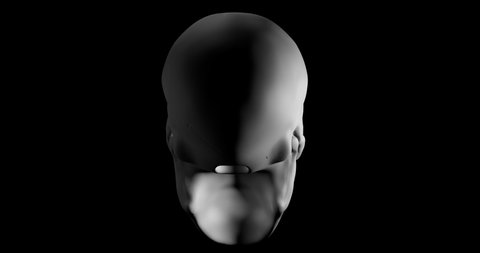 Human skull gyrating on black background