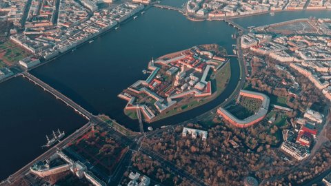 The morning flight over the sights of St. Petersburg and the water area of the Neva river, Peter and Paul fortress, Rostral columns, bridges, St. Isaac cathedral, the Admiralty