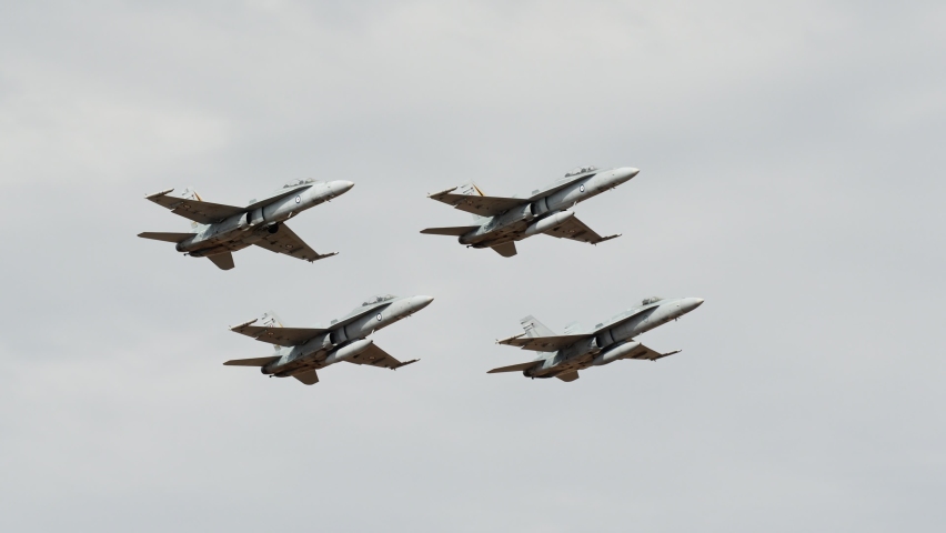 Avalon, Australia - March 3, 2019: Four Royal Australian Air Force FA-18 Hornet multirole fighter aircraft flying in close formation. 