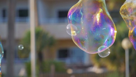 Soap bubbles floating in the air in slow motion 180fps