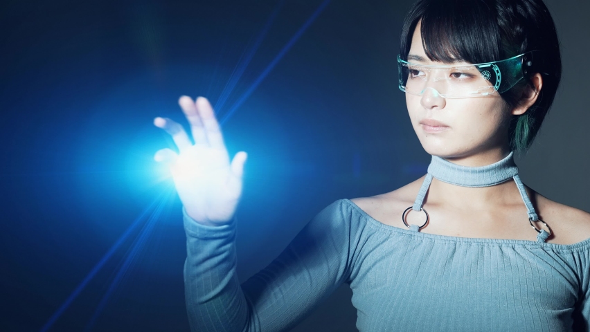 Asian woman wearing smart glasses. Head mounted display. Wearable computer. Virtual reality. Royalty-Free Stock Footage #1073298155