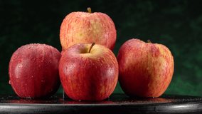 Close-up of a red-green apple with water droplets macro shot. - Powered by Shutterstock - Get 15% off with code: PIKWIZARD15