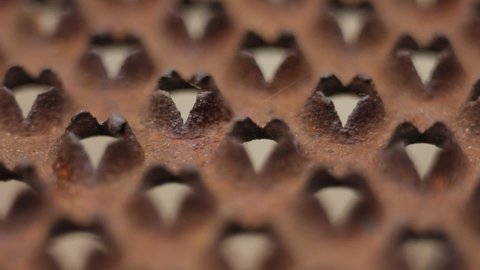 macro footage of a rusty grater, selective focus