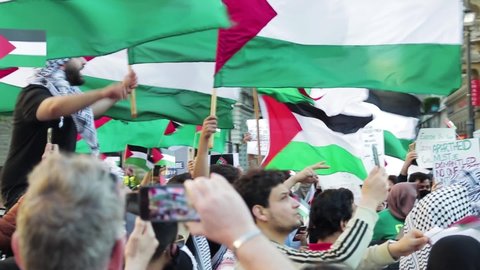 Budapest, Hungary - 29th of May 2021: Demonstration for the Palestinian people against the Israeli occupation in front of St. Stephen's Basilica with flags.