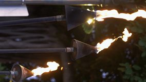 Vertical video of tiki torch in Hawaii in 4k slow motion 60fps
