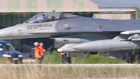 Andravida air Base Greece APRIL, 03, 2019 Military pilot in the cockpit of an armed military Jet. Lockheed Martin F-16 C Fighting Falcon or Viper of United States Air Force USAF