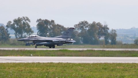 Andravida air Base Greece APRIL, 03, 2019 Lockheed Martin F-16 C Fighting Falcon or Viper of United States Air Force USAF slow down speed on the runway after landing