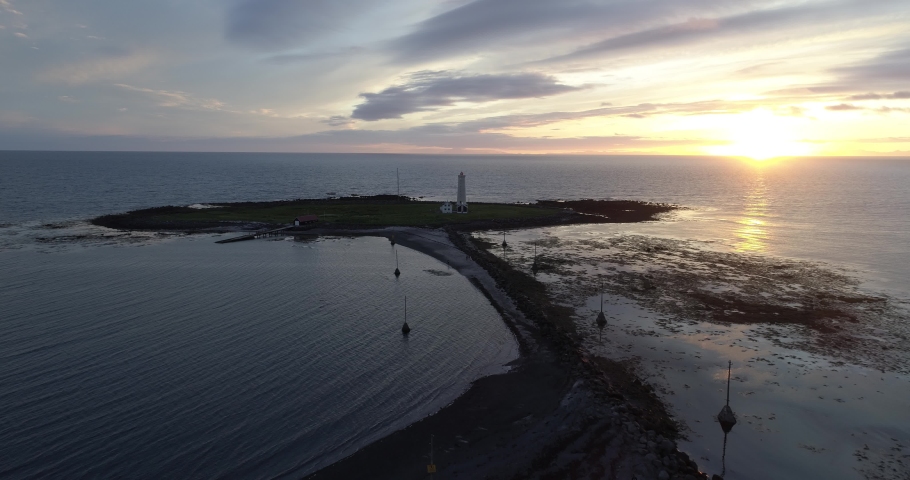drone view from Iceland Lighthouse at sunrise, February 2021

Aerial view over Grótta Island Lighthouse,Reykjavik,Iceland
