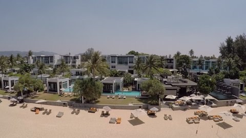 Phuket, Thailand - March 15 2015: Aerial beachfront view of private pool villas at the Aleenta Phuket Resort and Spa Hotel