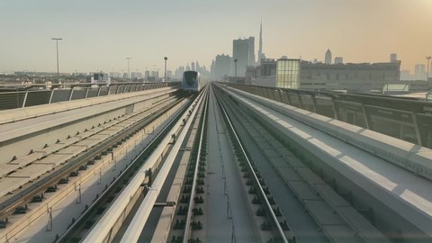 Dubai, United Arab Emirates, May 2021-Riding Dubai metro with a view on Dubai Skyline