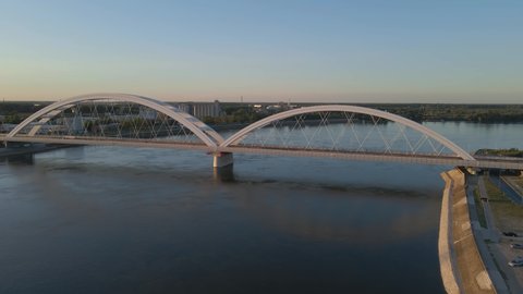 Aerial drone view of new Zezelj bridge in Novi Sad, Serbia connecting two sides of Danube river for railroad and transportation architecture concept