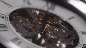 Mechanical Pocket Watch With Visible Gears And Hand Ticking, macro, focus pull - Powered by Shutterstock - Get 15% off with code: PIKWIZARD15