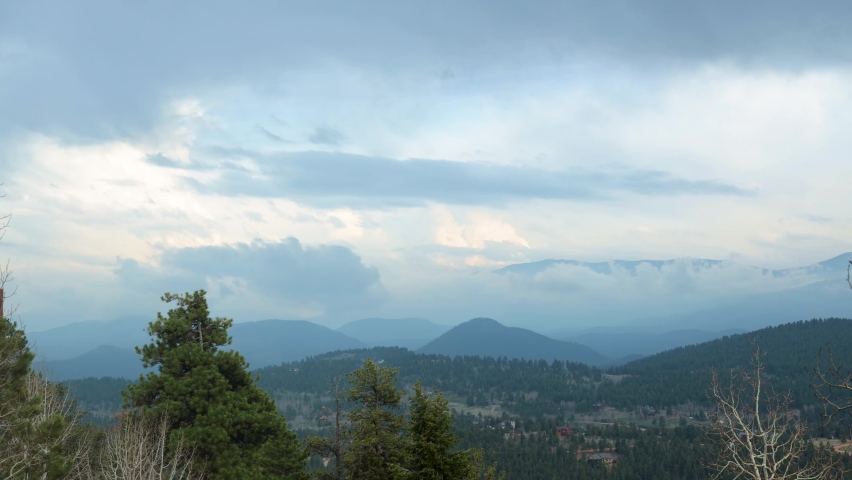 Stormy clouds building during a timelapse, spring weather, viewing the Lost Creek Wilderness and Green Mountain in the Pike National Forest in the Rock Mountains, Colorado, USA.