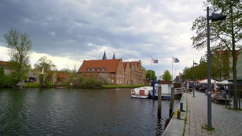 The banks of River Trave in the city of Lubeck - LUBECK, GERMANY - MAY 11, 2021