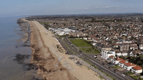 West Worthing seafront promenade and West Parade road heading towards Goring by Sea. Aerial footage.