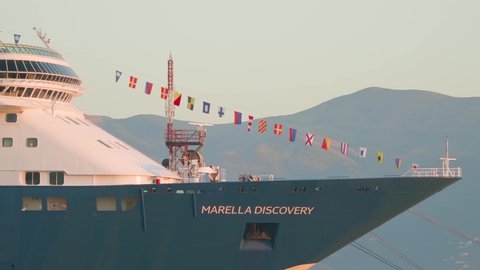 CORFU, GREECE, SEPTEMBER 27, 2019: Close up of the bow of the Tui Discovery Marella cruise anchored in city port.