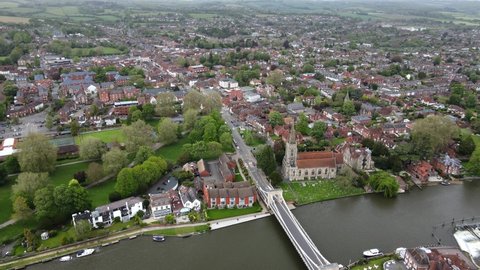 Marlow suspension bridge and town Buckinghamshire on River Thames UK aerial footage 4K