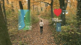 Back view of man running in woods and overlay graphics of health and heart rate. Tracking shot - Powered by Shutterstock - Get 15% off with code: PIKWIZARD15