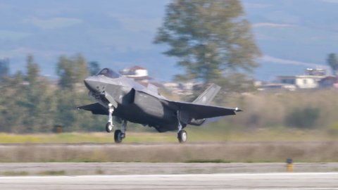 Andravida Greece APRIL, 03, 2019 F-35 fighter jet landing on military airport runway. Lockheed Martin F-35 Lightning II is a stealth multirole combat aircraft of Italian Air Force