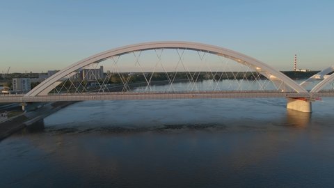 Aerial drone view of new Zezelj bridge in Novi Sad, Serbia connecting two sides of Danube river for railroad and transportation architecture concept