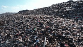 Mountain large garbage pile and pollution,Pile of stink and toxic residu - Powered by Shutterstock - Get 15% off with code: PIKWIZARD15