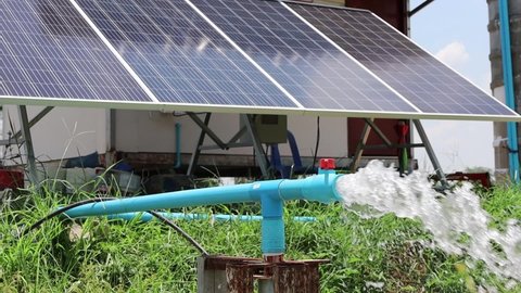 Water flows from the PVC pipe. The silver groundwater is pumped by a solar powered submersible pump from a Smart Farm solar panel.