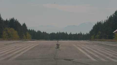 Cessna aircraft landing on a runway Texada Island British Columbia Sunshine Coast Canada