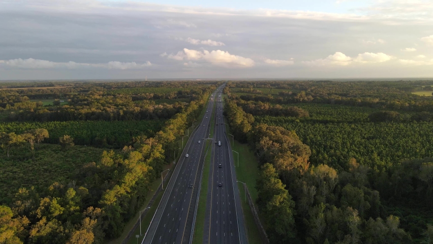 freeway interstate in georgia transportation cars and trucks passing by Royalty-Free Stock Footage #1073424974