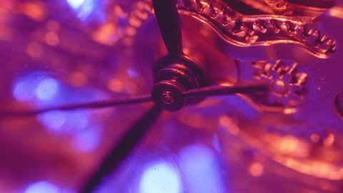 Macro Of Second Hand Moving In Mechanical Pocket Watch With Blue And Red Light. - timelapse