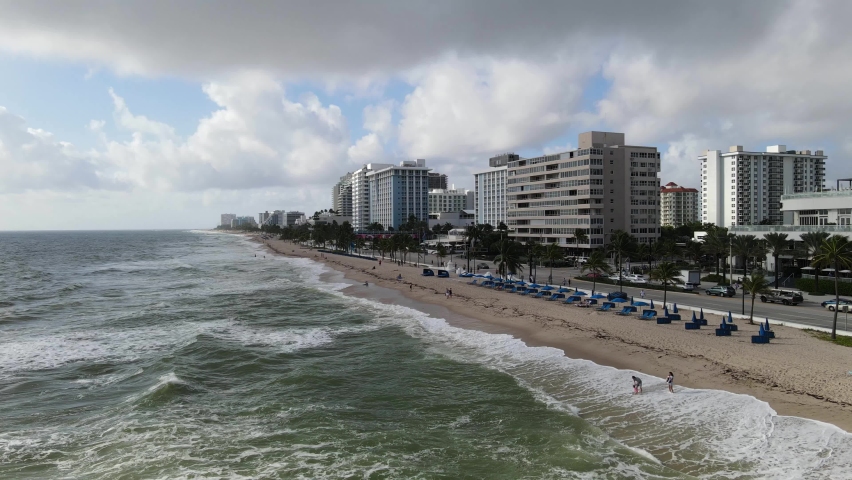 Fort Lauderdale city in florida shoreline ocean waves sunny afternoon