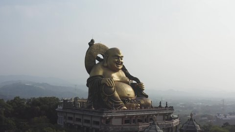 Circular View Around The Spectacular Gigantic Golden Maitreya Buddha Sculpture at Hushan Temple at Douliu City Taiwan.