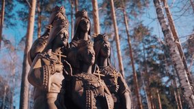 Monument to the Royal family of Tsar Nicholas II in Yekaterinburg, Ganina Yama. Video. Memorial of Romanov family on the background of trees and blue sky.