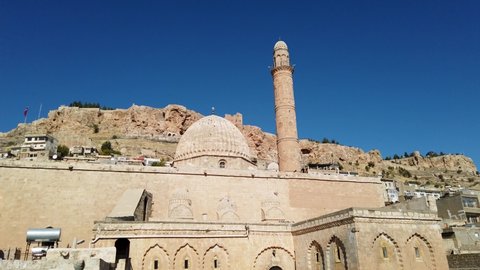 Mardin, Turkey - January 2020: Ulu Cami, also known as Great mosque of Mardin with single minaret in Mardin cityscape